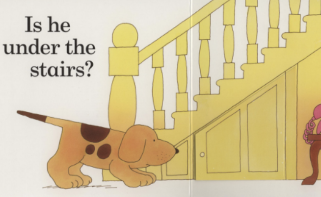 A dog looks for her lost puppy under the stairs. Illustration from “Where’s Spot?”